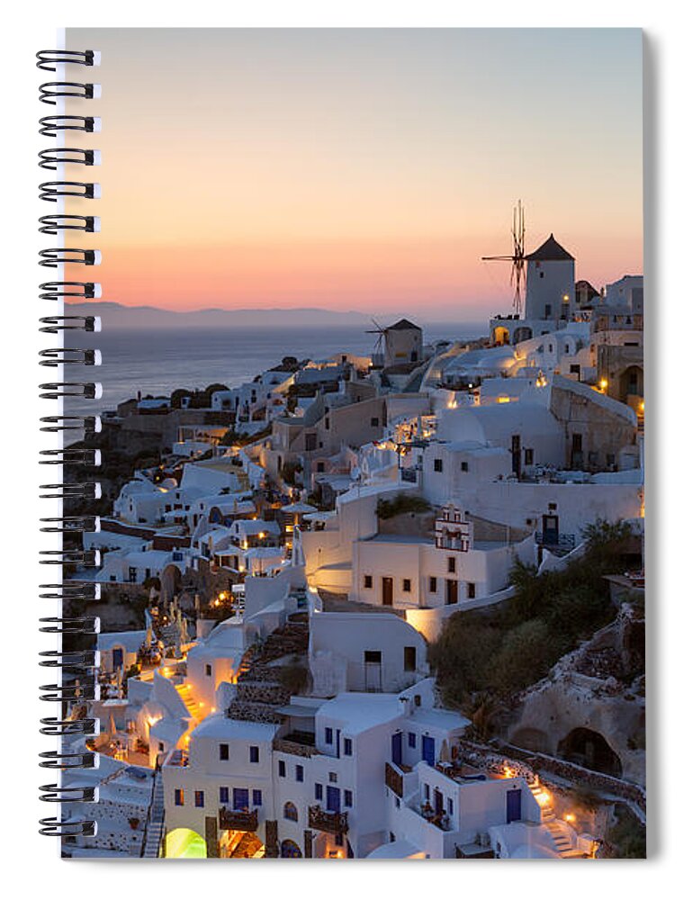 Greece Spiral Notebook featuring the photograph Romantic sunset over the village of Oia Greece Santorini by Matteo Colombo