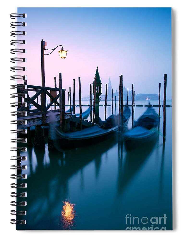 Gondolas Spiral Notebook featuring the photograph Row of gondolas at sunrise in Venice - Italy by Matteo Colombo