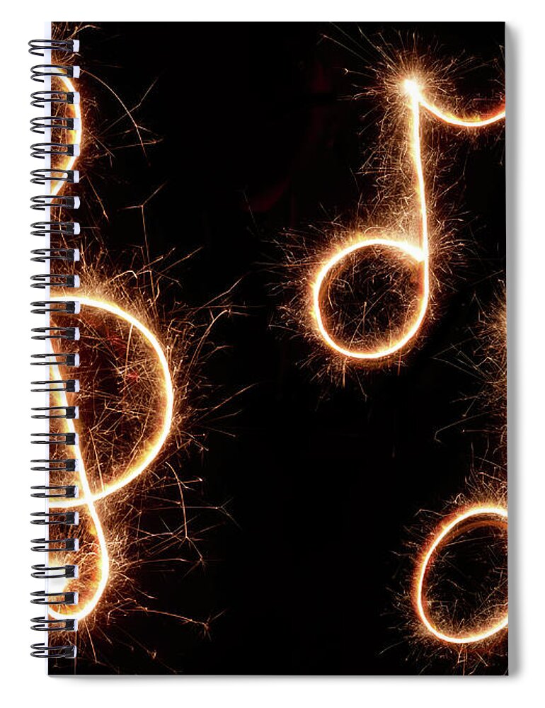 Light Painting Spiral Notebook featuring the photograph Sparkling Musical Symbols by Lauren Nicole
