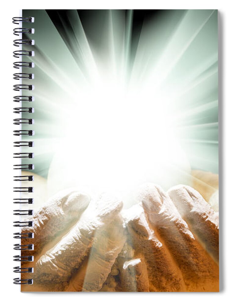 Spiritual Spiral Notebook featuring the photograph Spiritual light in cupped hands on a black background by Simon Bratt