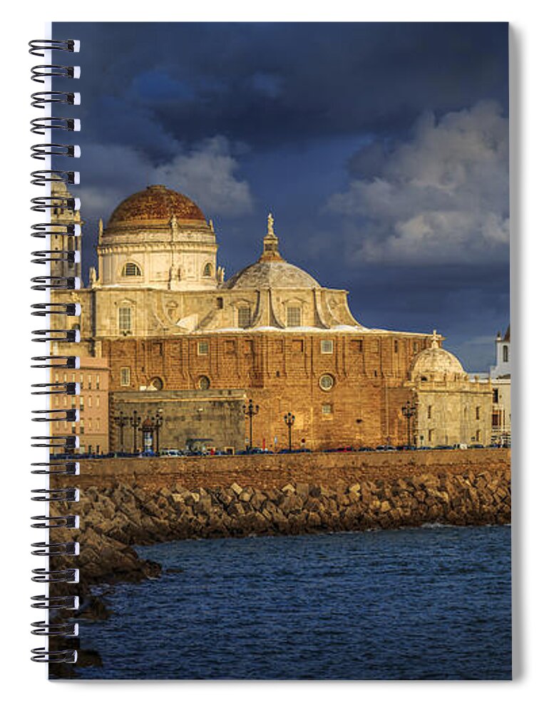 Andalucia Spiral Notebook featuring the photograph Stormy Skies Over the Cathedral Cadiz spain by Pablo Avanzini