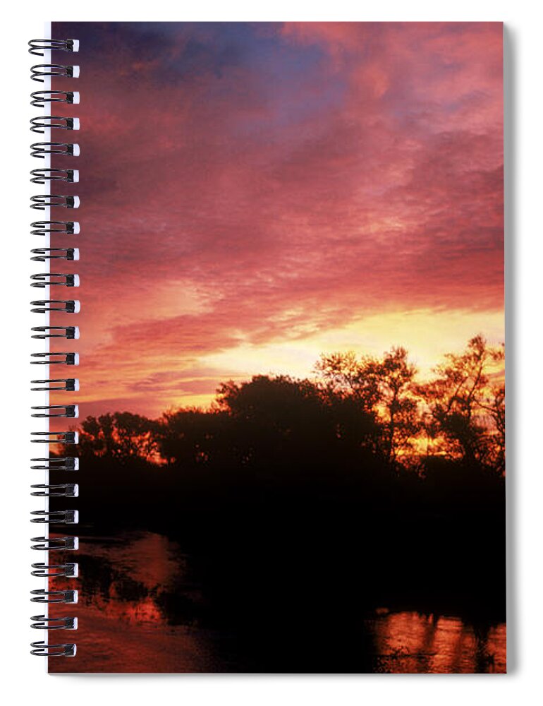 Astronomy Spiral Notebook featuring the photograph Sunrise by Dan Guravich