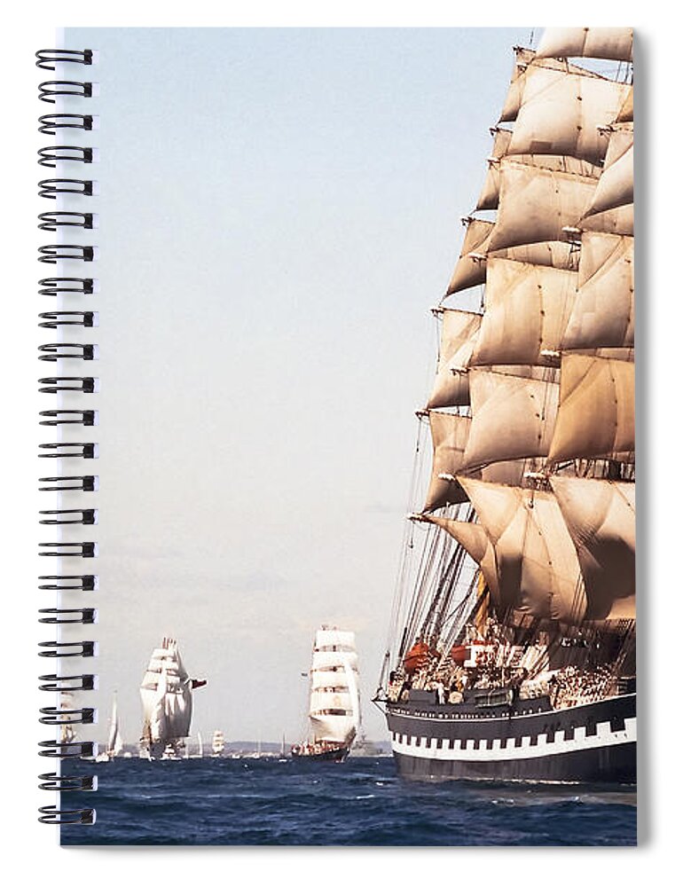 Kruzenshtern Spiral Notebook featuring the photograph The Kruzenshtern departing the port of Cadiz 1992 by Pablo Avanzini