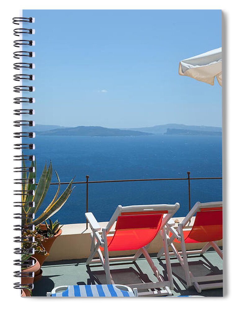 Santorini Spiral Notebook featuring the photograph Two deckchairs on the roof Santorini Greece by Michal Bednarek