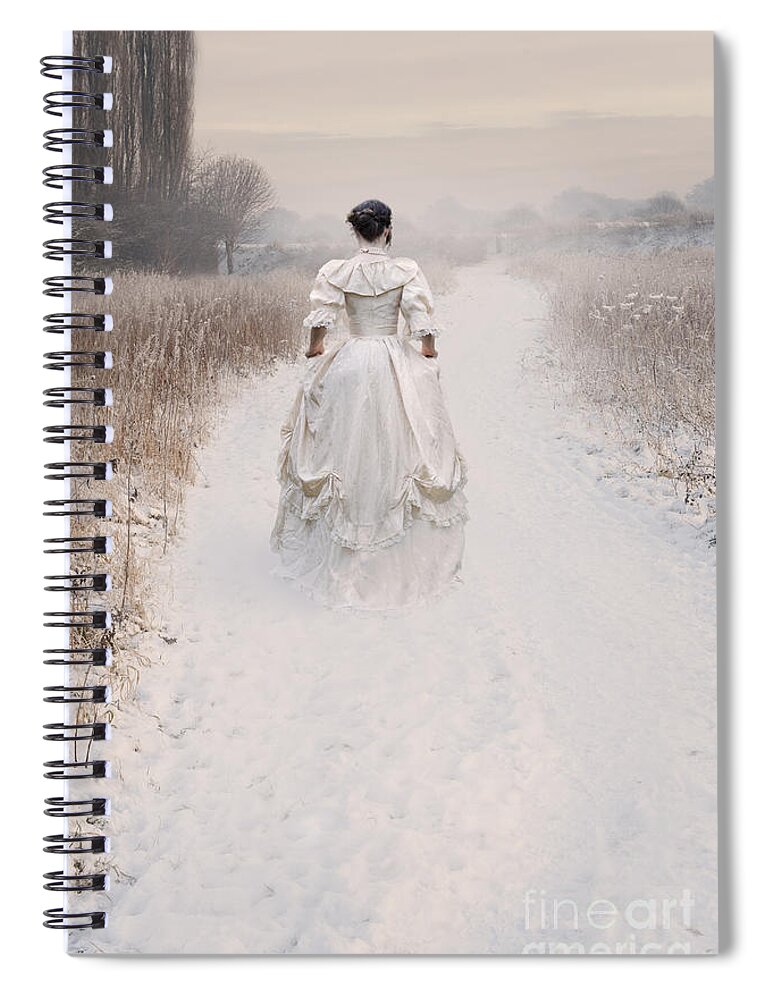 Woman Spiral Notebook featuring the photograph Victorian Woman Walking Through A Winter Meadow by Lee Avison