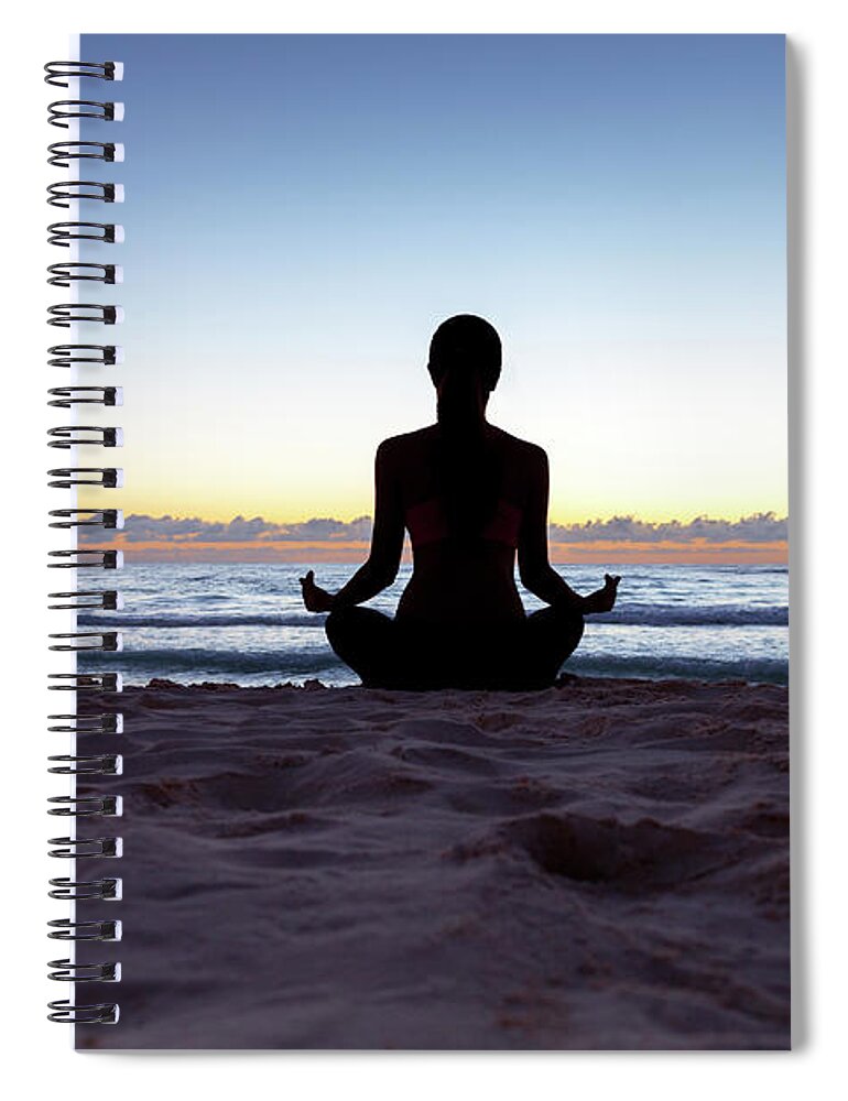 Dawn Spiral Notebook featuring the photograph Woman Doing Yoga On The Beach by Aldomurillo