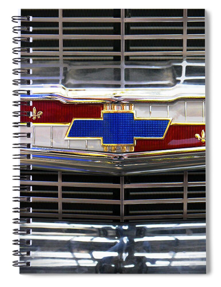 Transportation Spiral Notebook featuring the photograph 1956 Chevrolet Grill Emblem by Mike McGlothlen