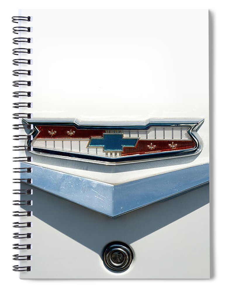 57 Chevey Spiral Notebook featuring the photograph 57 Chevy Emblem by Mark Dodd