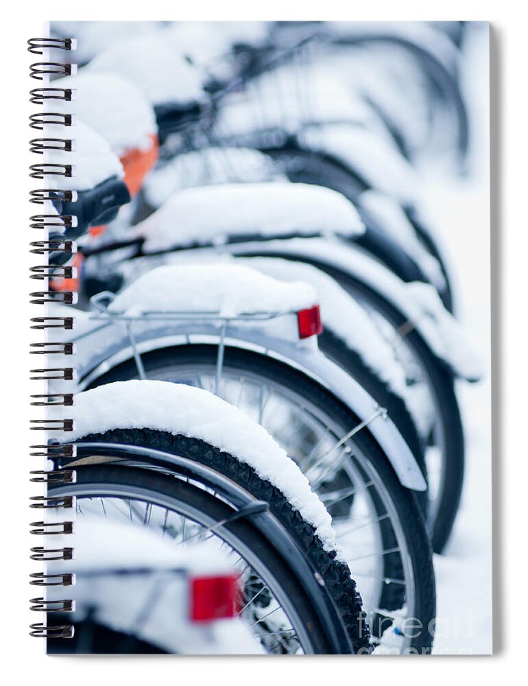 Abstract Spiral Notebook featuring the photograph Bikes in snow by Andrew Michael
