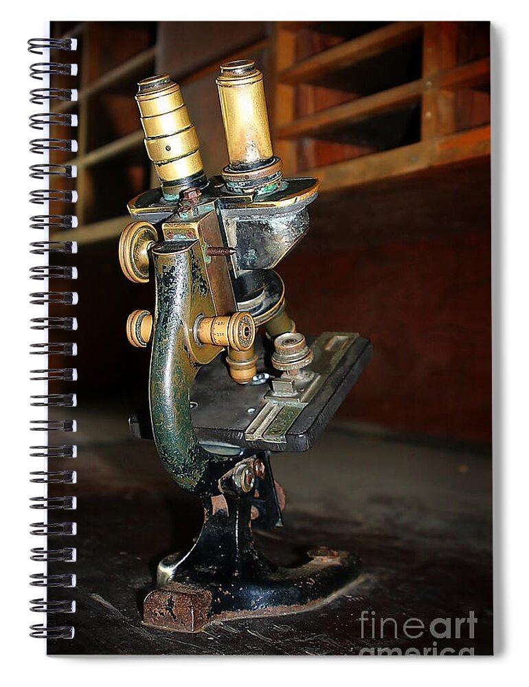 Old Spiral Notebook featuring the photograph Old Microscope by Henrik Lehnerer