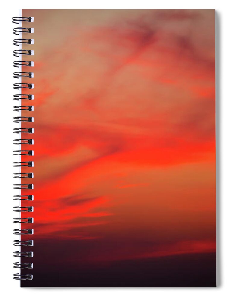 Adventure Spiral Notebook featuring the photograph a gorgeous sunset with luminous red clouds over the Yala Nationalpark by Gina Koch