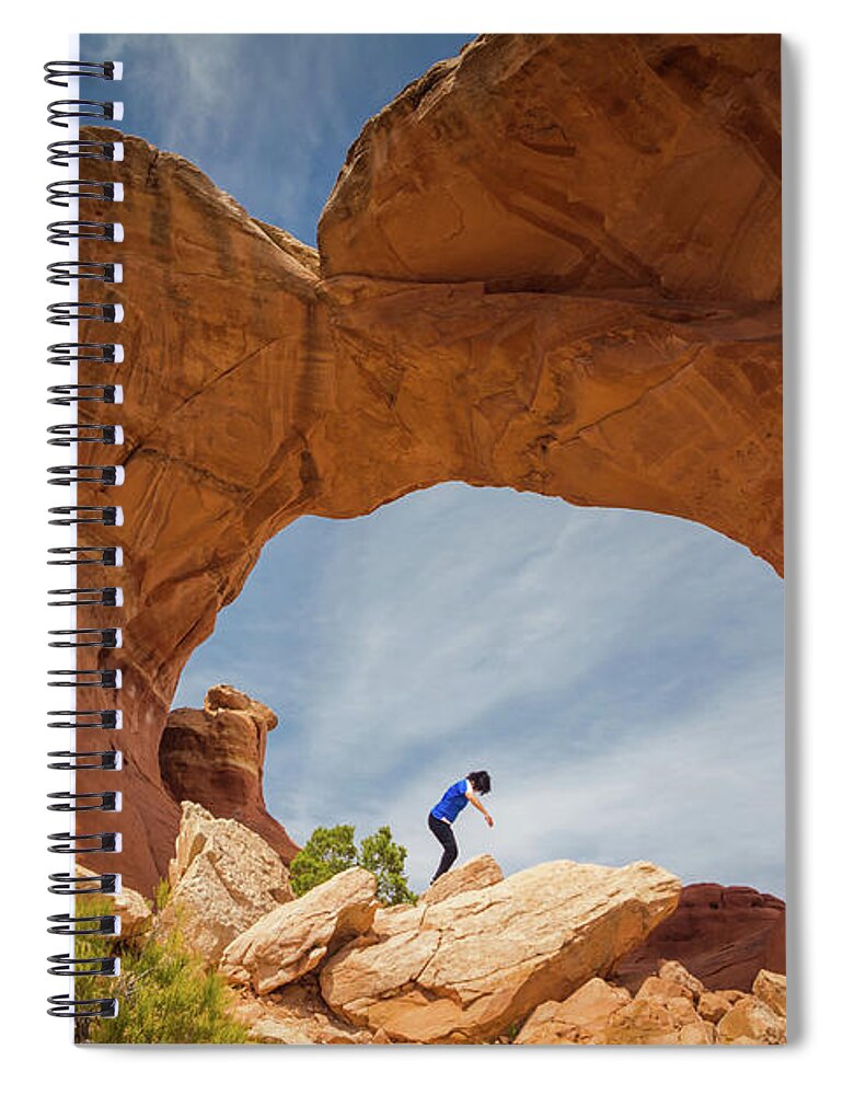 Arches Spiral Notebook featuring the photograph Balancing under an Arch by Agnes Caruso