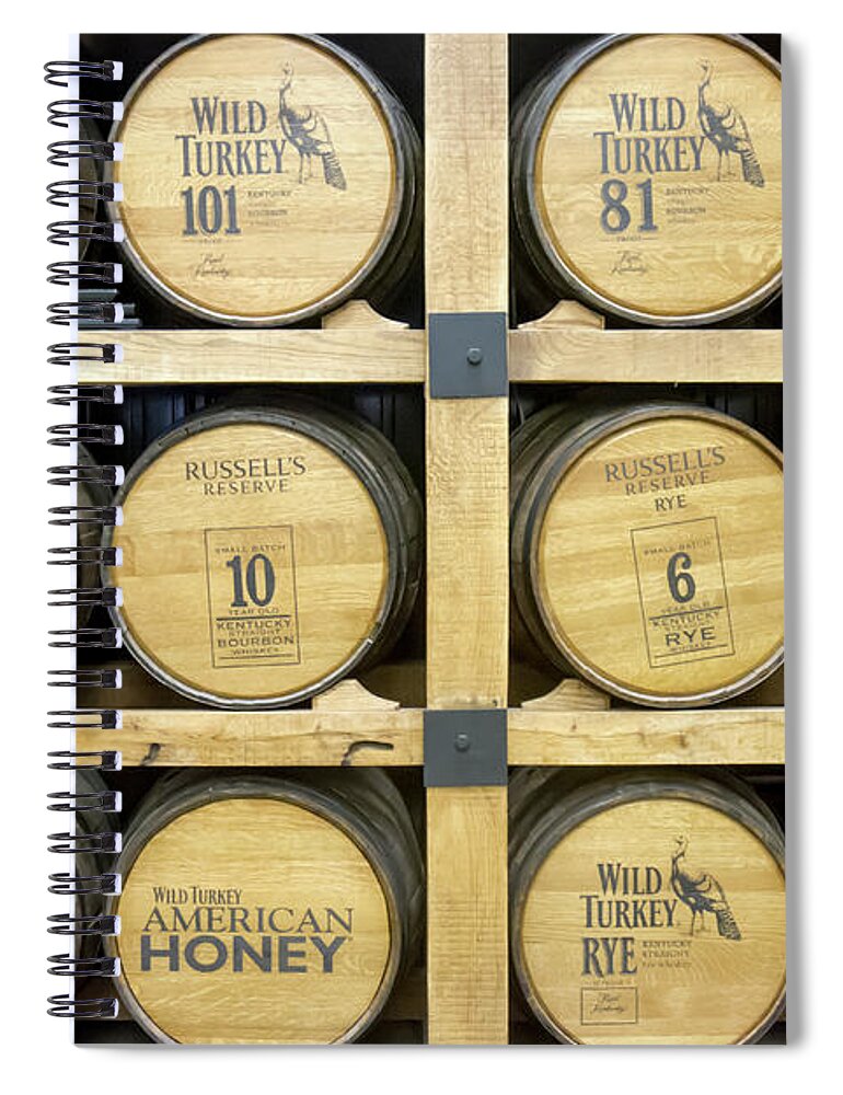 American Spiral Notebook featuring the photograph Barrels of Wild Turkey Bourbon in distillery by Karen Foley