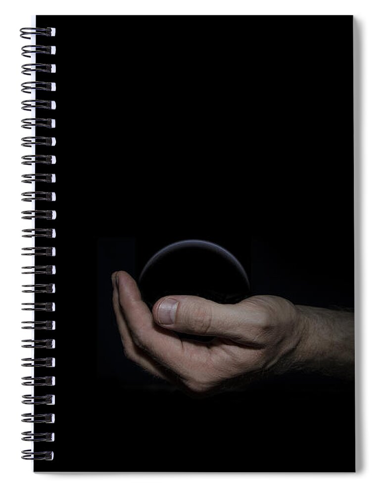 Black Spiral Notebook featuring the digital art Black Sphere in Hand by Pelo Blanco Photo