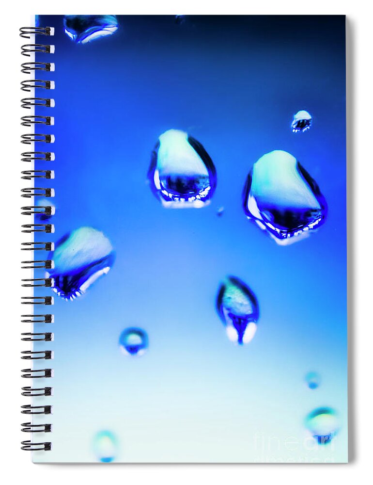 Water Spiral Notebook featuring the photograph Blue water droplets on glass by Jorgo Photography