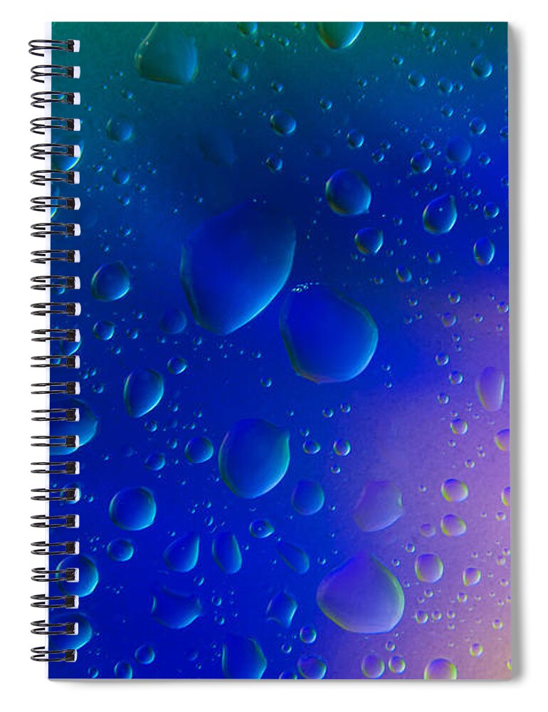 Abstract Spiral Notebook featuring the photograph Colorfull Water drop background abstract by Michalakis Ppalis