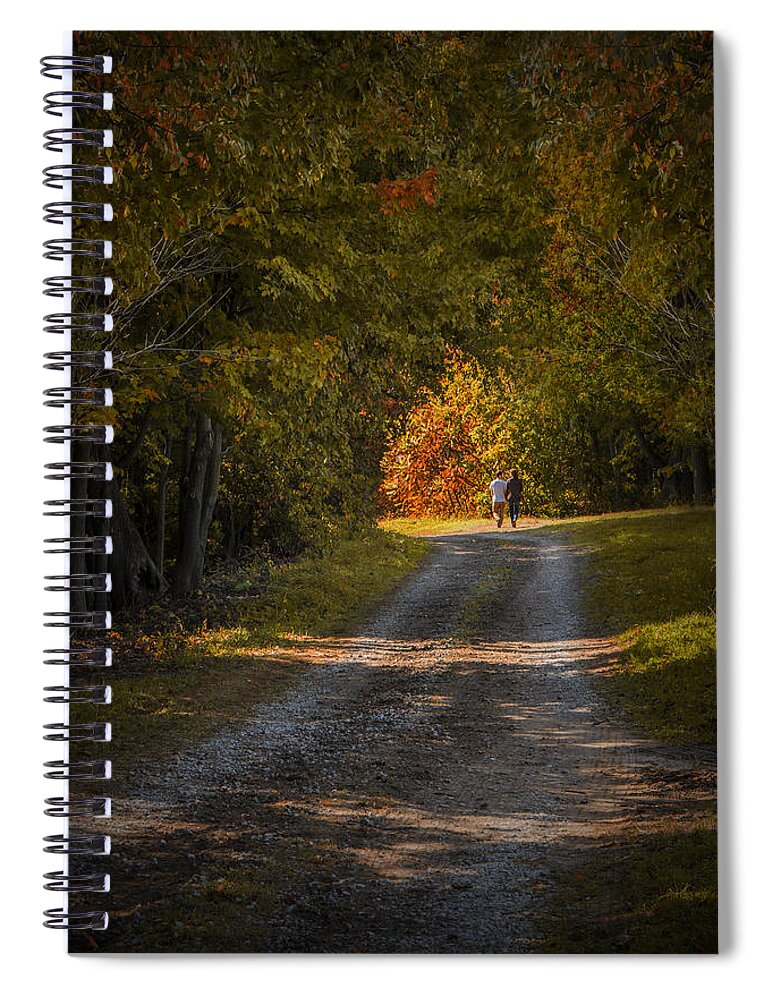 Art Spiral Notebook featuring the photograph Couple walking on a Dirt Road through a Tree Canopy during Autumn by Randall Nyhof