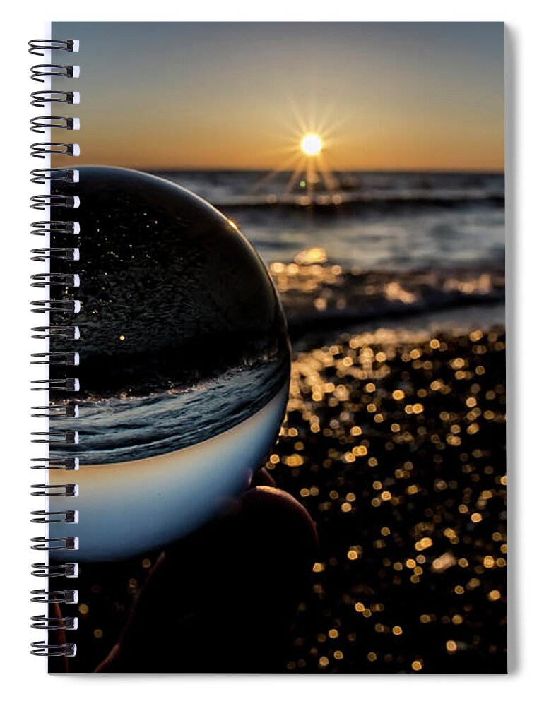 Glass Ball Spiral Notebook featuring the photograph Glass ball on the beach at sunrise by Sven Brogren