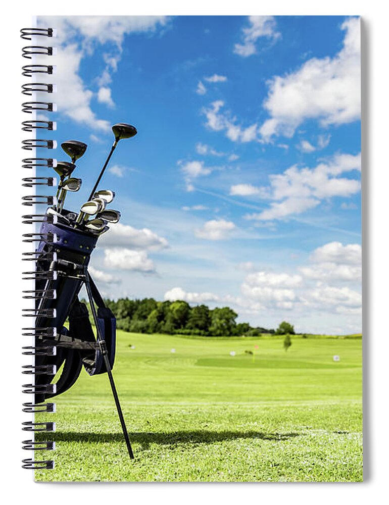 Golf Spiral Notebook featuring the photograph Golf equipment bag standing on a course. by Michal Bednarek