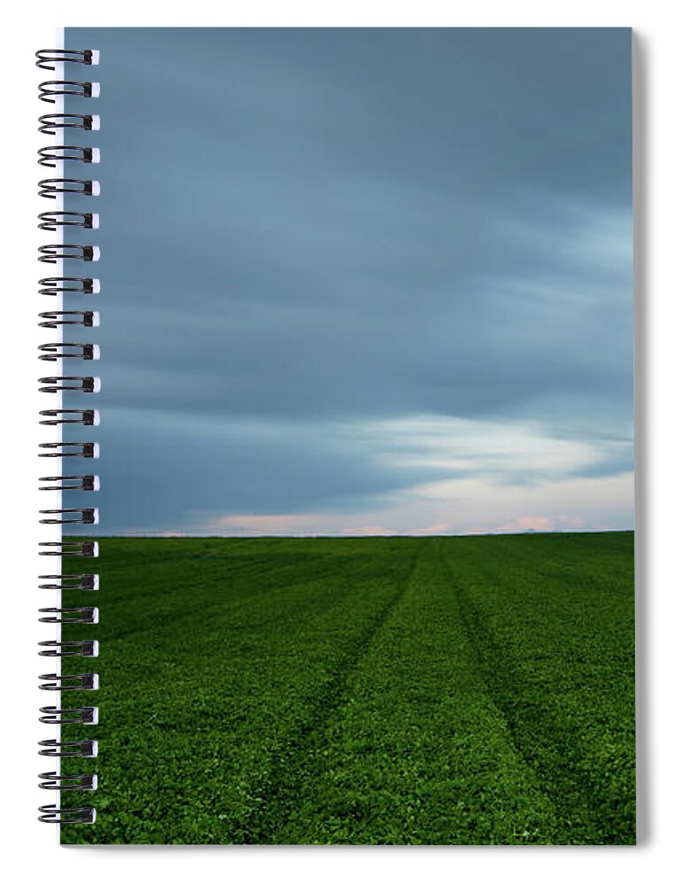 Freedom Spiral Notebook featuring the photograph Green field and cloudy sky by Michalakis Ppalis