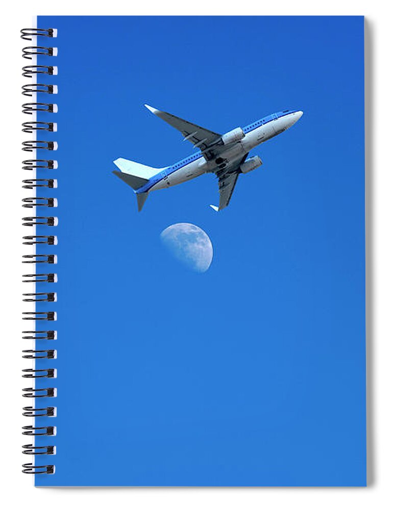 Jet Spiral Notebook featuring the photograph Jet plane flying over the moon by Steve Ball