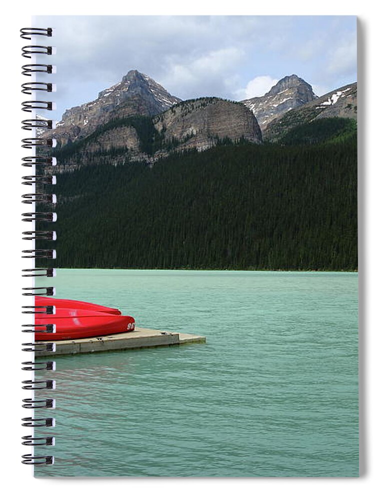 Mountain Spiral Notebook featuring the photograph Lake Louise Red Canoes by Christiane Schulze Art And Photography
