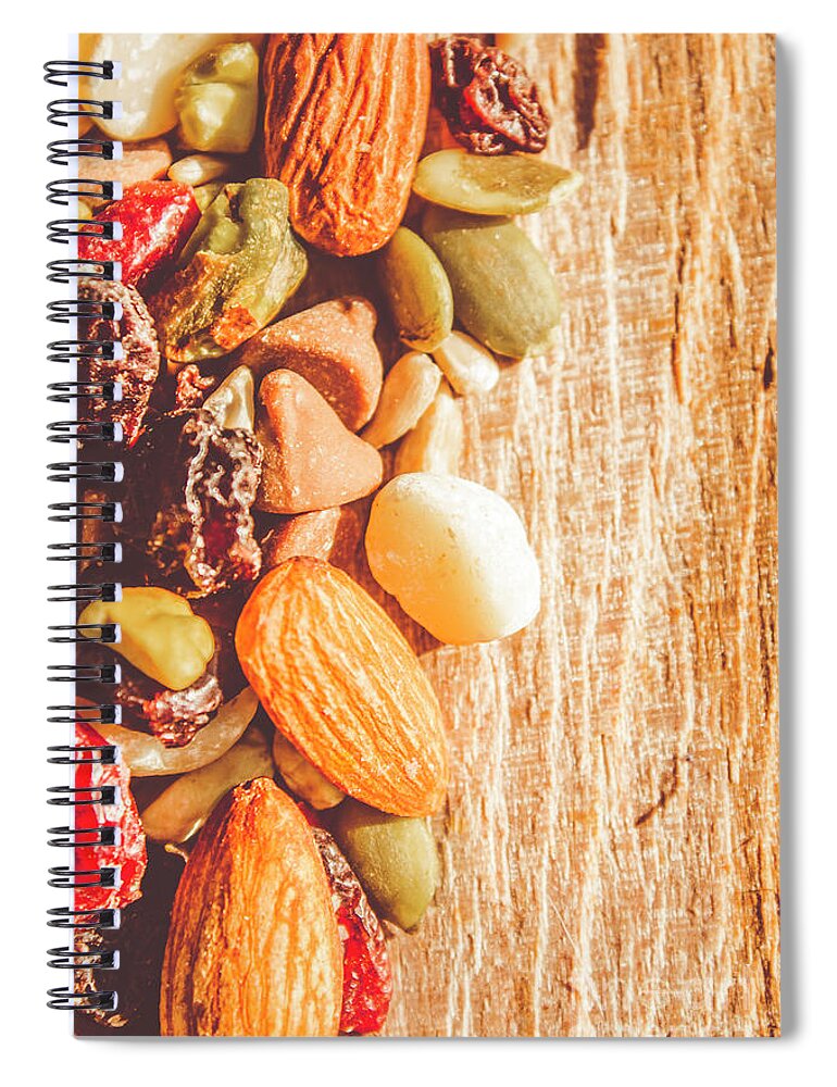 Nuts Spiral Notebook featuring the photograph Mixed nuts on wooden background by Jorgo Photography