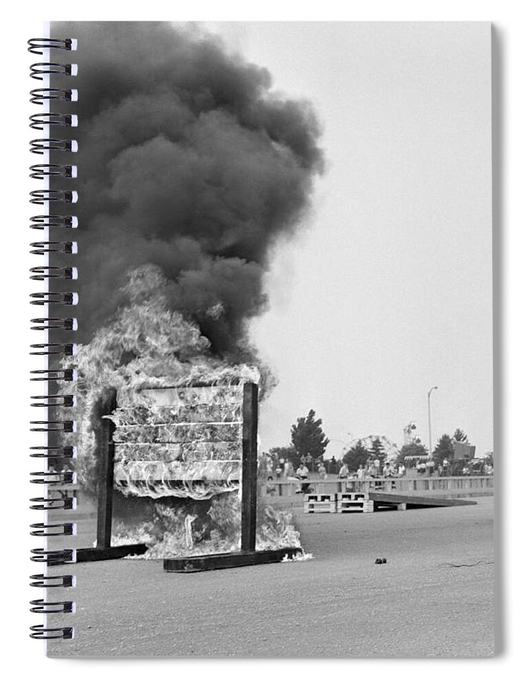 1960s Spiral Notebook featuring the photograph Motorcycle Stunt, C.1960s by H. Armstrong Roberts/ClassicStock