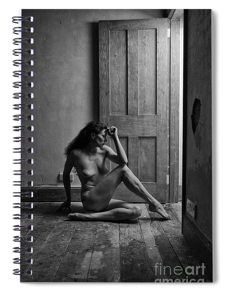 Woman Spiral Notebook featuring the photograph Nude woman sitting by doorway in abandoned room by Clayton Bastiani