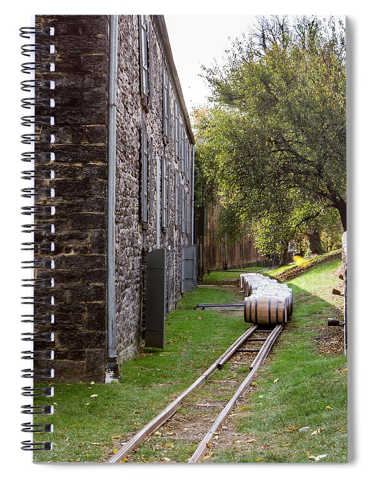 American Spiral Notebook featuring the photograph Oak barrels outside stone distillery by Karen Foley