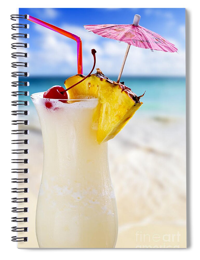 Pina Colada Spiral Notebook featuring the photograph Pina colada cocktail on the beach by Elena Elisseeva