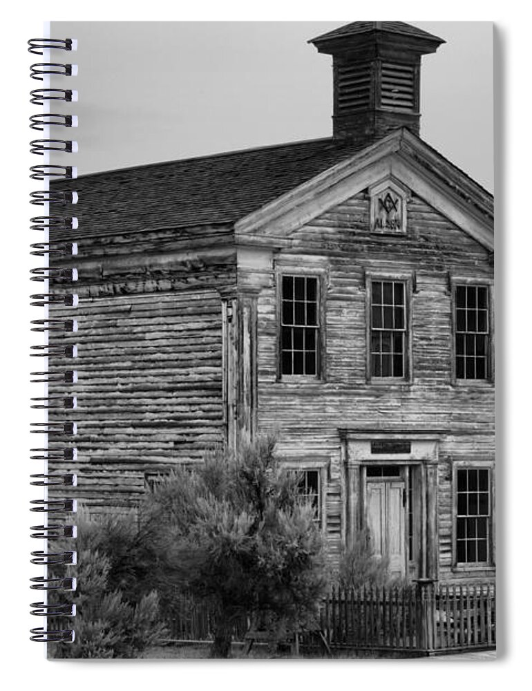 Bannack Spiral Notebook featuring the photograph Pink Skies Over The Bannack School House Black And White by Adam Jewell