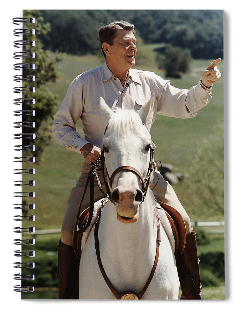 Ronald Reagan Spiral Notebook featuring the photograph Ronald Reagan On Horseback by War Is Hell Store