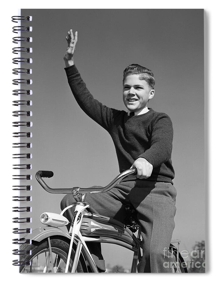 1940s Spiral Notebook featuring the photograph Smiling Boy On Bike Waving Arm by H. Armstrong Roberts/ClassicStock