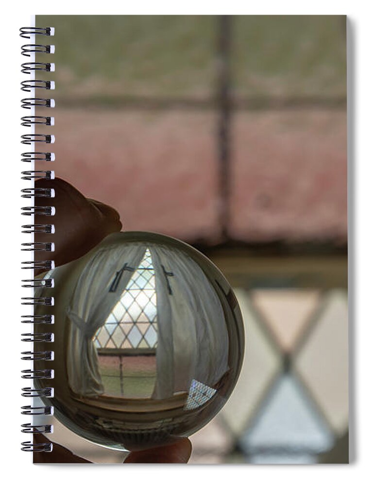Abandoned Spiral Notebook featuring the photograph Stained glass window with curtains in crystal ball by Karen Foley