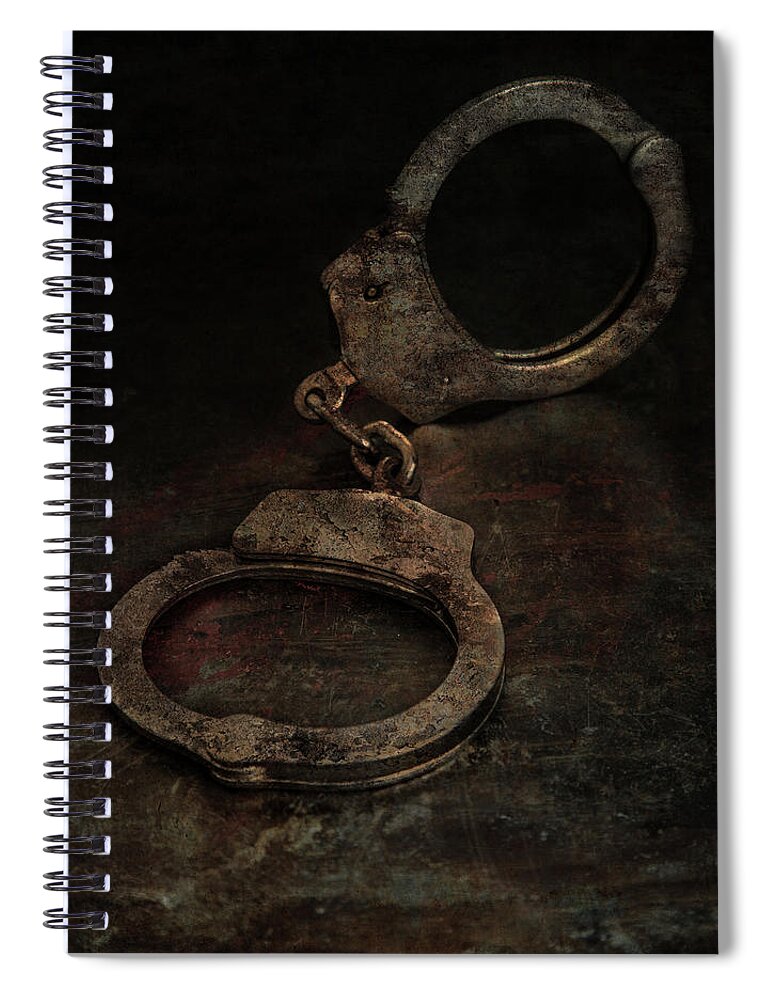 Still Life Spiral Notebook featuring the photograph Still life with old rusty handcuffs by Jaroslaw Blaminsky