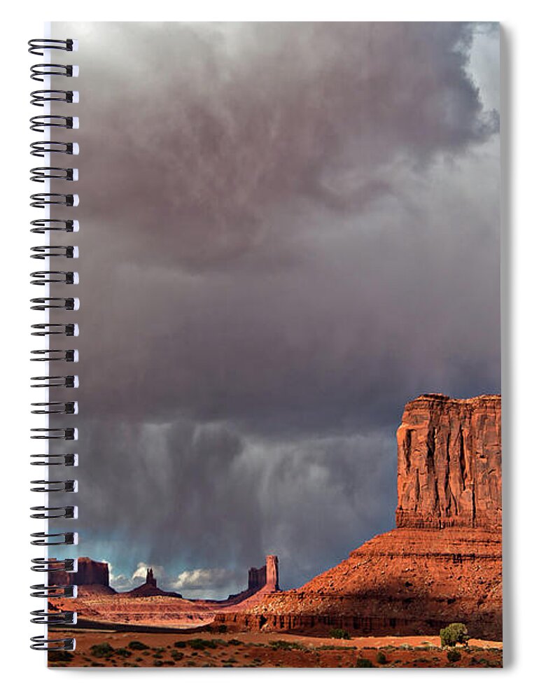 Desert Spiral Notebook featuring the photograph Storm over Monument Valley by Wesley Aston