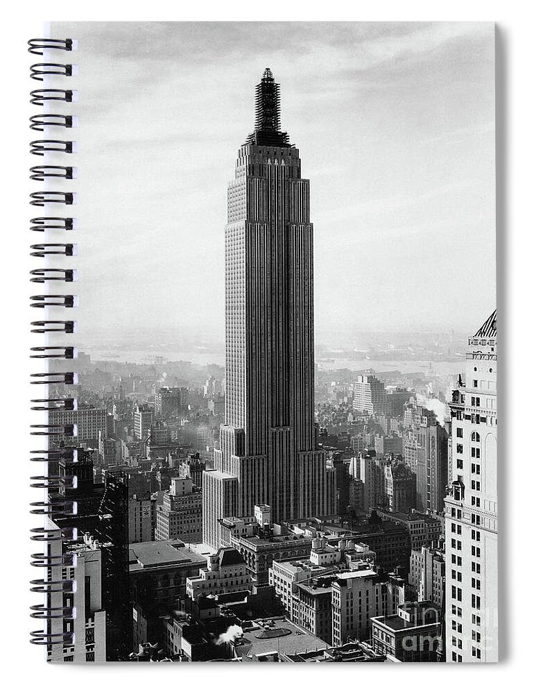Empire State Building Spiral Notebook featuring the photograph The Empire State Building Under Construction by Jon Neidert