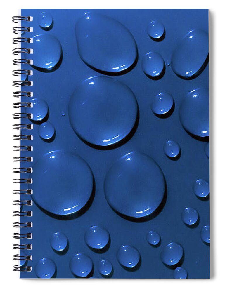 Water Spiral Notebook featuring the photograph Water drops pattern on blue background by Simon Bratt