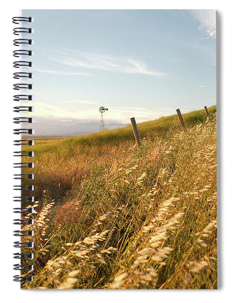 Windmill Spiral Notebook featuring the photograph Windmill and the Fence Sundown by Troy Stapek