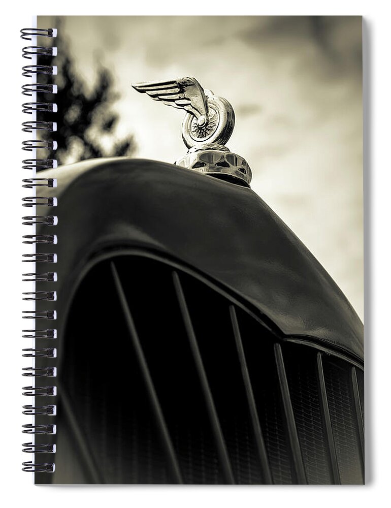 Hood Ornament Spiral Notebook featuring the photograph Winged Wheel by Caitlyn Grasso