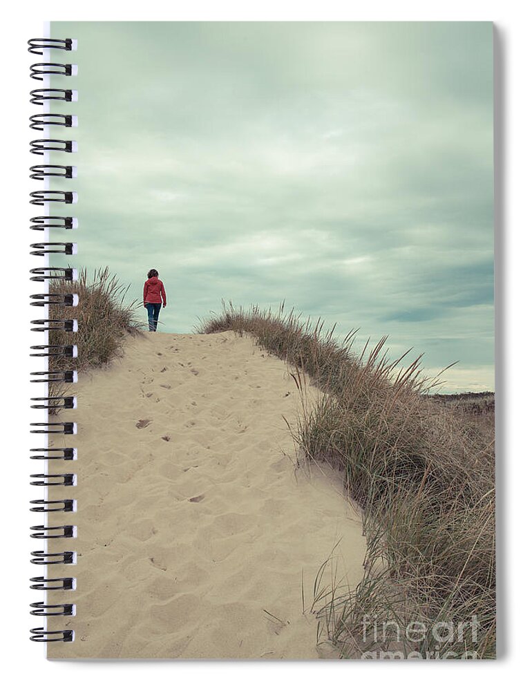 Cape Cod Spiral Notebook featuring the photograph Woman walking in the dunes of Cape Cod by Edward Fielding