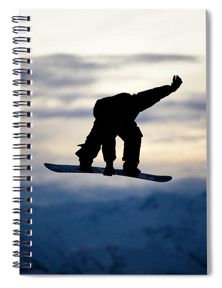 Recreational Pursuit Spiral Notebook featuring the photograph A Male Snowboarder Does A Backside 180 #1 by Kyle Sparks