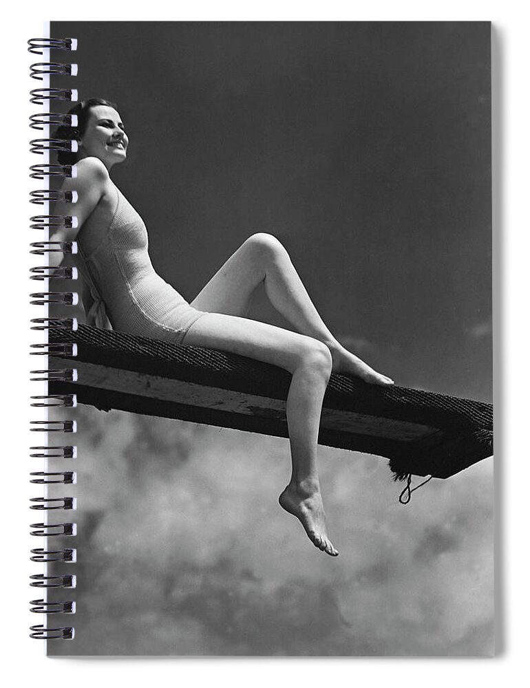 People Spiral Notebook featuring the photograph Woman Sitting On Divingboard #1 by George Marks