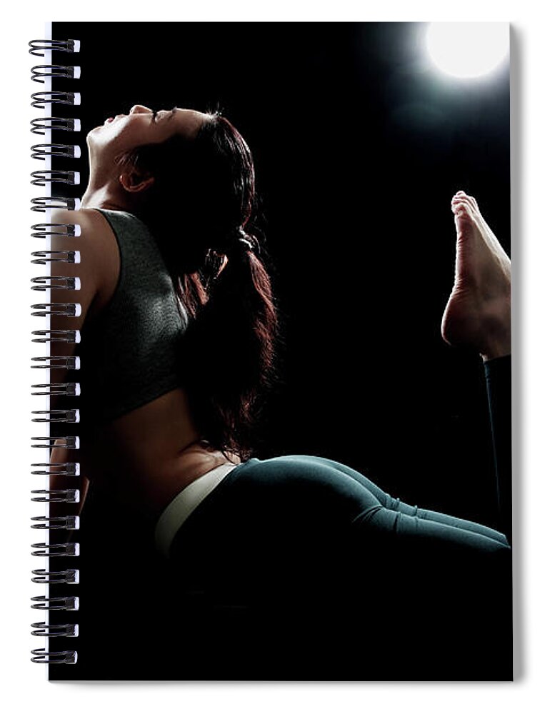 People Spiral Notebook featuring the photograph Young Woman Stretching #1 by Runphoto