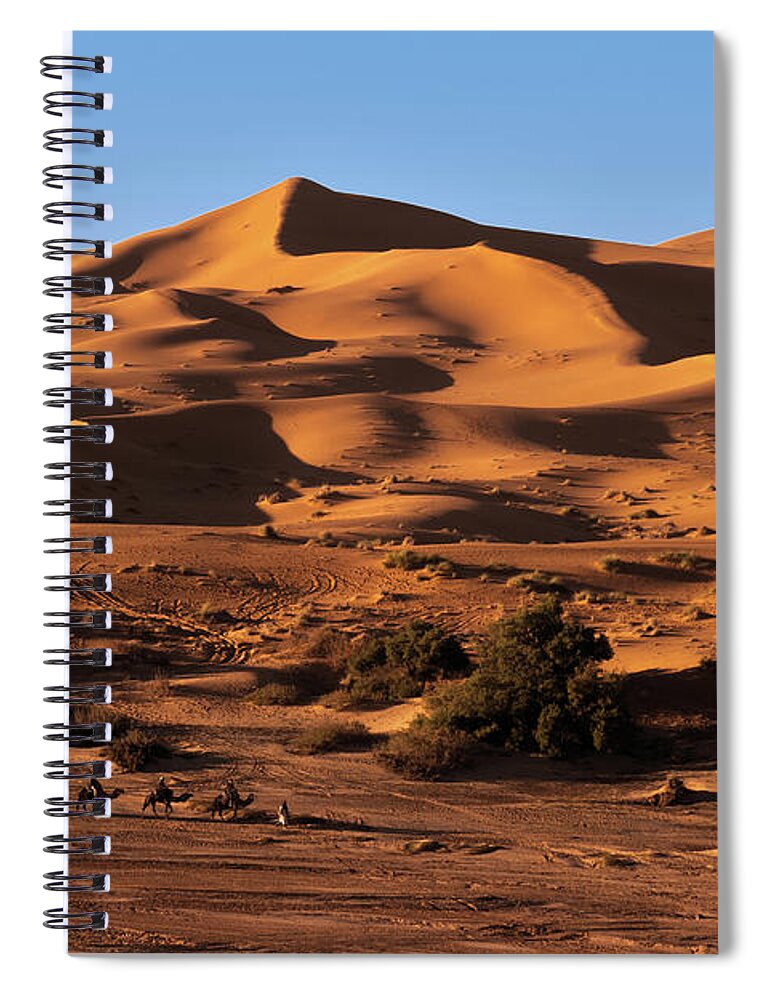 Sand Spiral Notebook featuring the photograph A caravan in the desert by Claudio Maioli