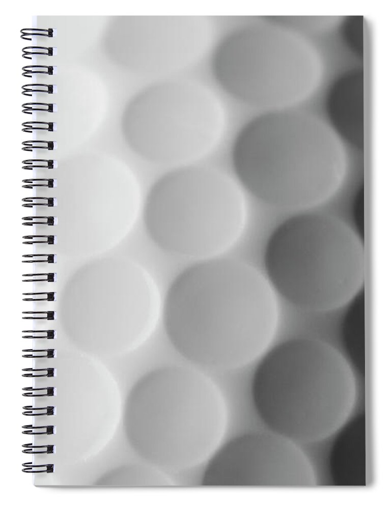 Ball Spiral Notebook featuring the photograph A Close Up Shot Of A Golf Ball, White by Anthiacumming