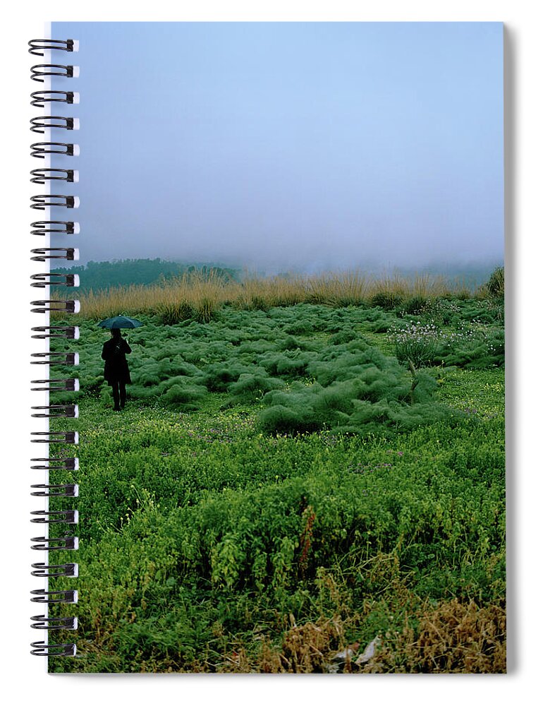 Poetry- Literature Spiral Notebook featuring the photograph A Woman With An Umbrella On A Field by Johner Images