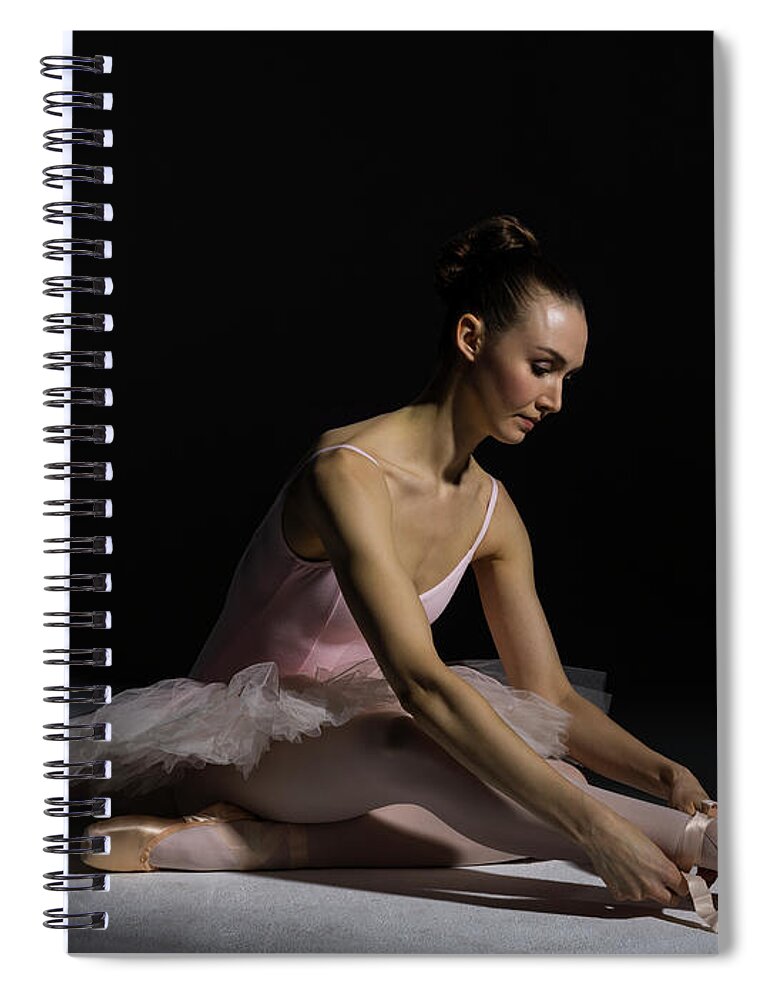 Tranquility Spiral Notebook featuring the photograph Ballerina Tying Pointe Shoe Ribbon by Nisian Hughes