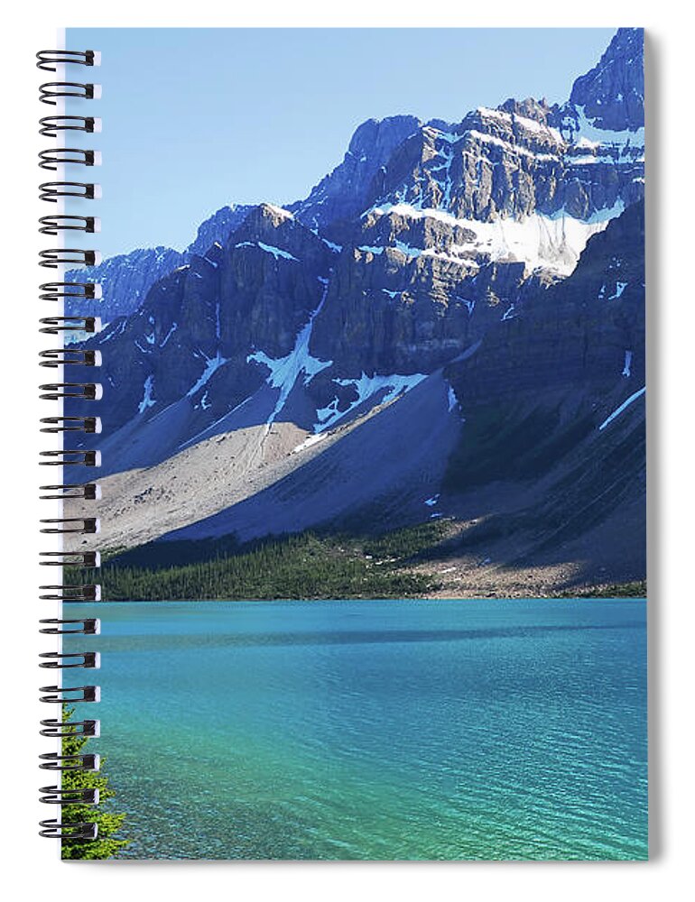 Scenics Spiral Notebook featuring the photograph Beautiful, Serene Bow Lake Beside Snow by Brytta